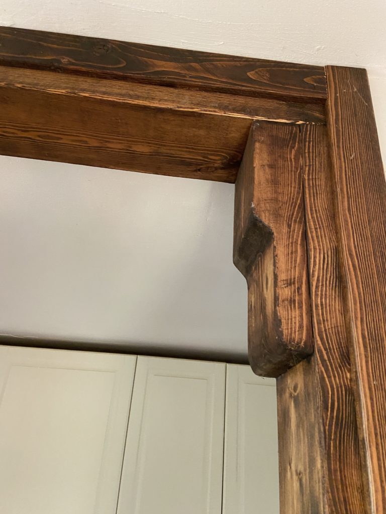 doorbreken muur keuken houten details
